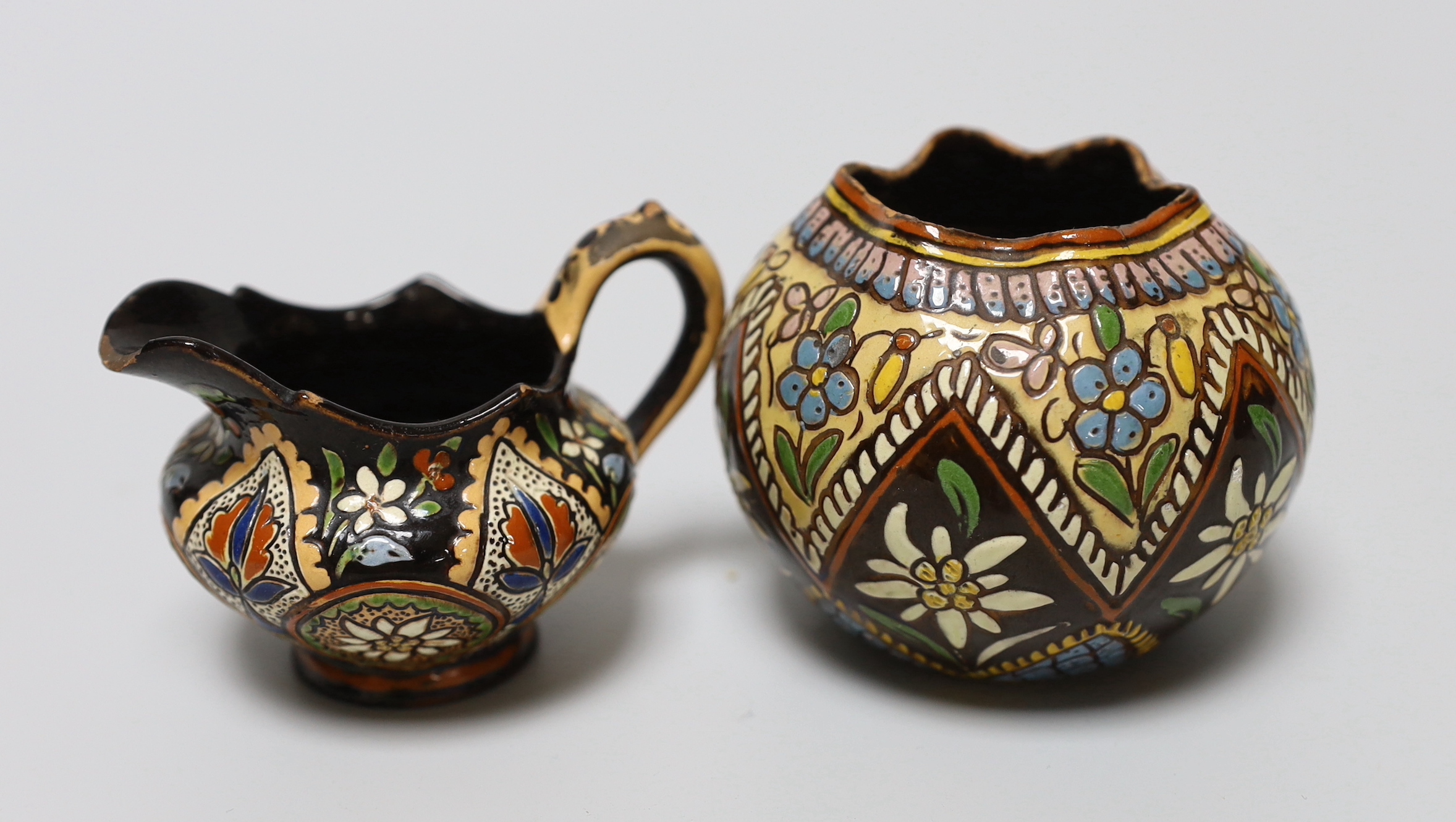 Three Thoune glazed earthenware items comprising dish, jug and vase, two signed to the base, the largest 12cm wide